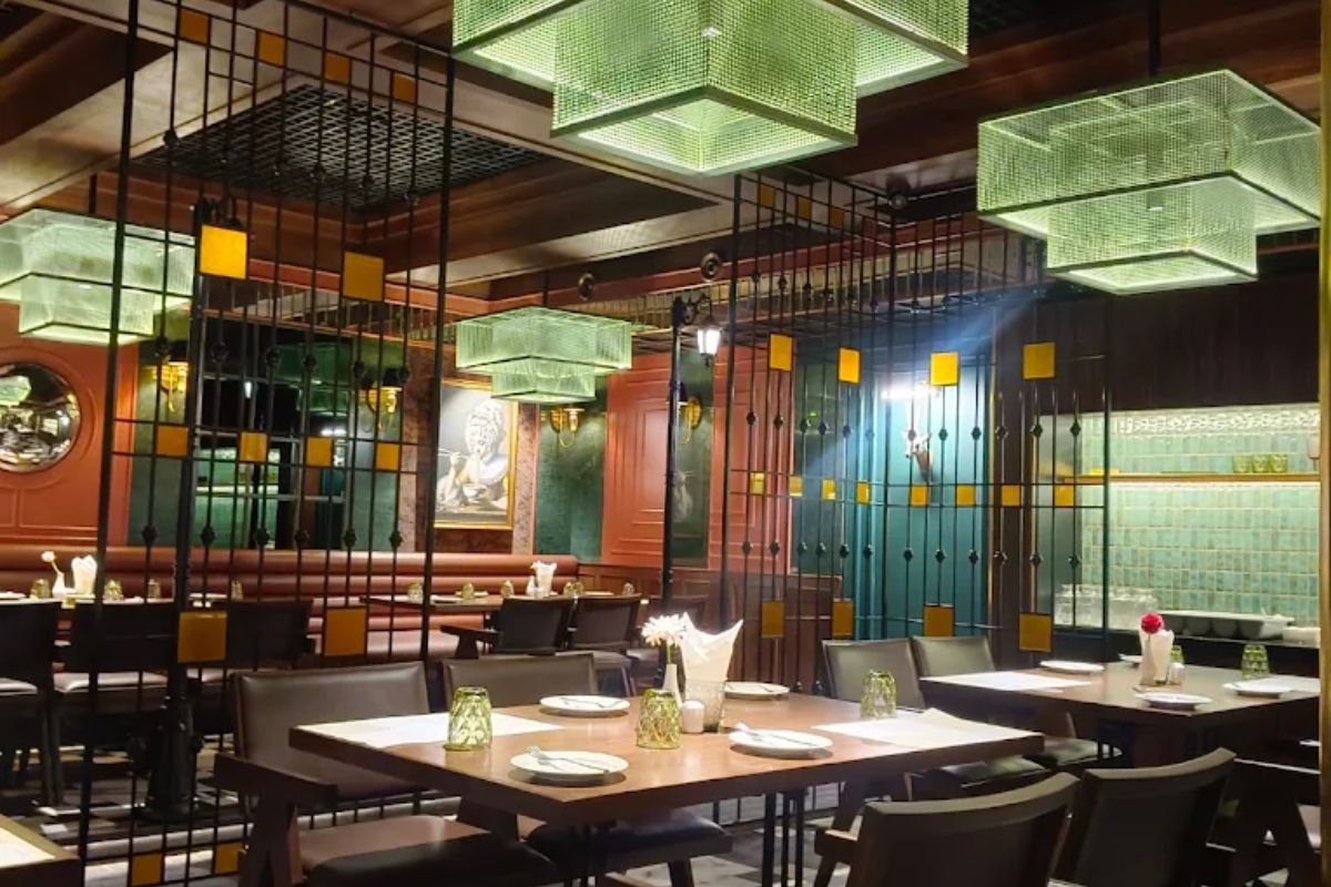Elegant dining setup with plated pasta at 10 Park Street Cafe and Kitchen, Golghar, Gorakhpur